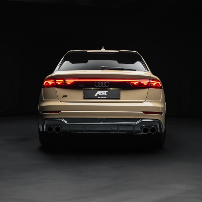 Rear view of gold ABT-tuned Audi SUV