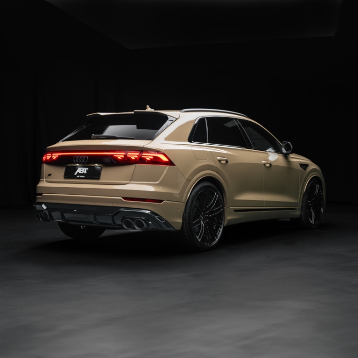 Rear three-quarter view of gold ABT-tuned Audi SUV